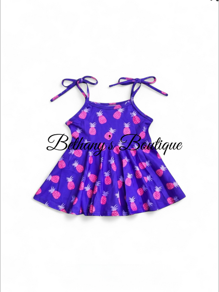 Pineapple tie peplum top