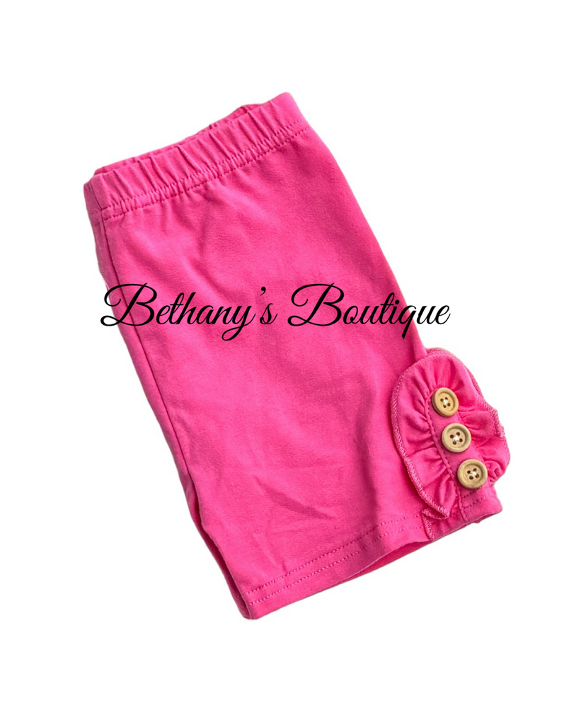 Pink biker shorts with buttons