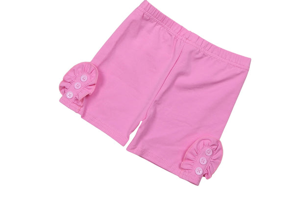 Pink biker shorts with buttons