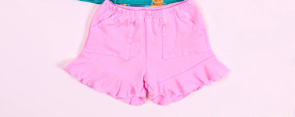 Pink ruffle shorts with pockets
